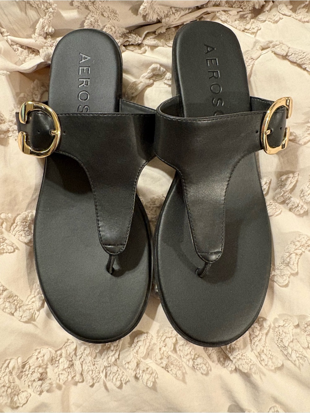 AEROSOLES Black Thong Sandals with Gold Buckle Accent